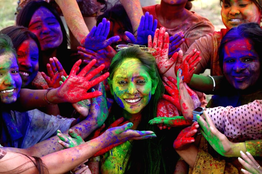 college students celebrate holi with colour 1344095