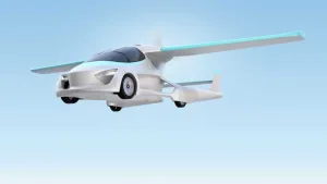السيارة الطائرة أصبحت واقعًا: AirCar تستعد للتحليق في الأسواق عام 2026 white modern drone flying sky